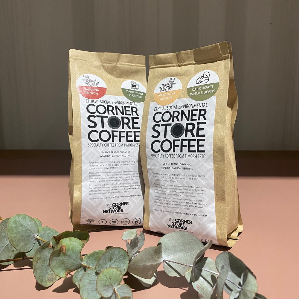 two bags of ethical timor coffee with australian foiliage 