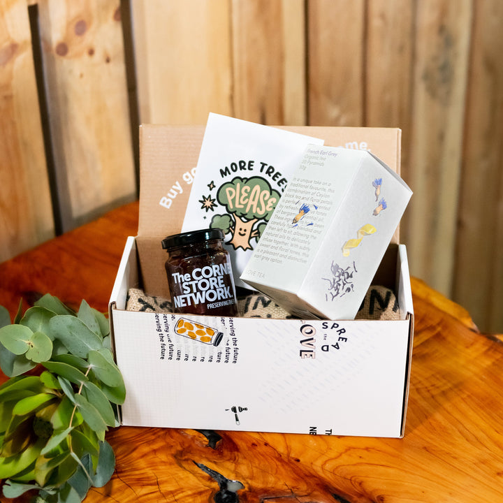 ethical sustainable gift box with jam, box of love tea and a tree planted
