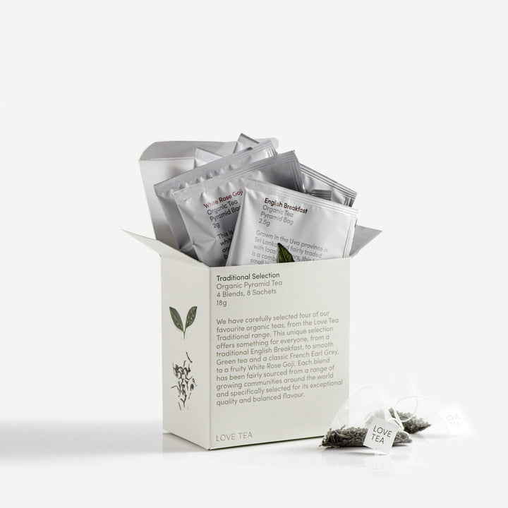 love tea sampler box with individually wrapped organic traditional tea bags sticking out the top
