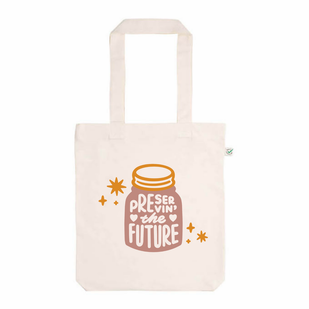organic white cotton tote with pink and orange design showing a jar with words preserving the future inside
